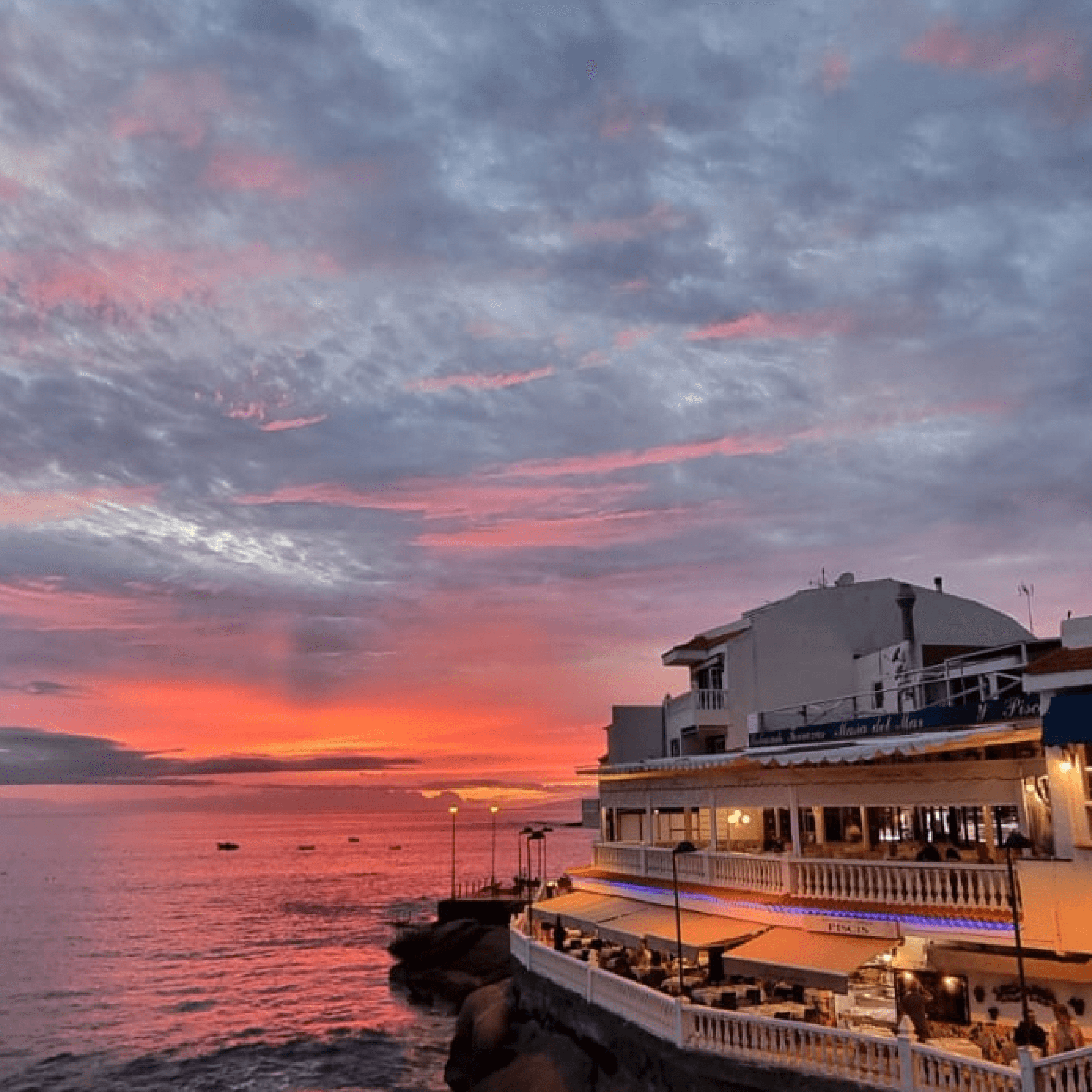 restaurante-costa-adeje-la-caleta-exterior-atardecer-sobre-el-mar